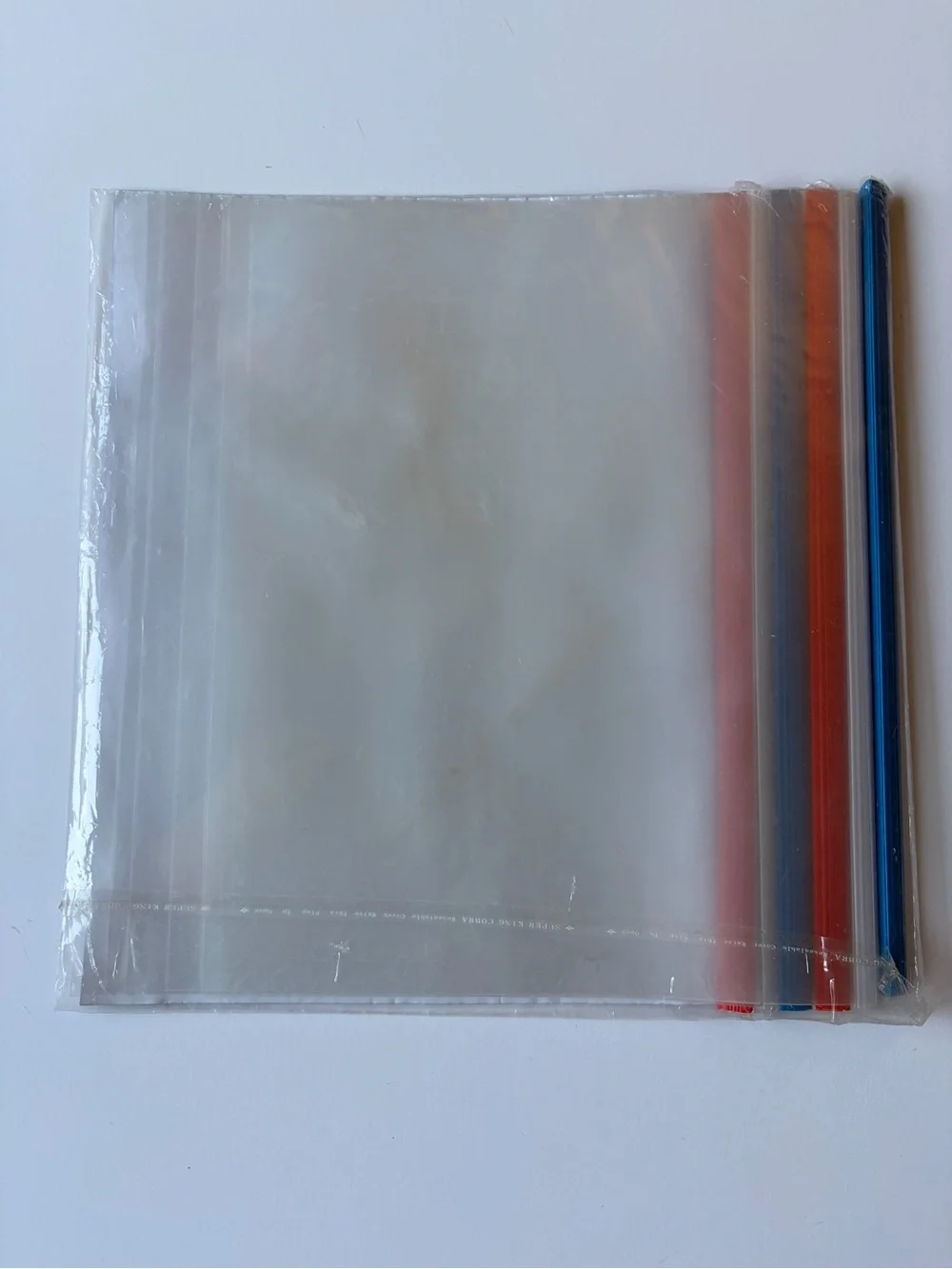 Pack of Six New See-thru Report Covers with Red White and Blue Colored Spines